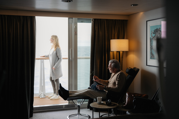 HX Hurtigruten Expeditions MS Fridtjof Nansen Expedition Suite Suite Lifestyle 1 ©Tuan Lam Atomic Pixel.jpg